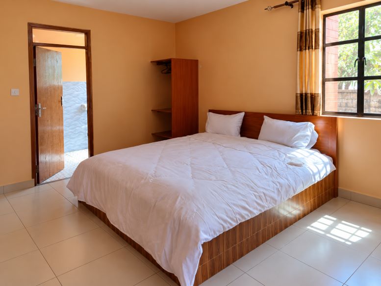 Apartment with living area and balcony at Peak Meadows Hotel Nyeri