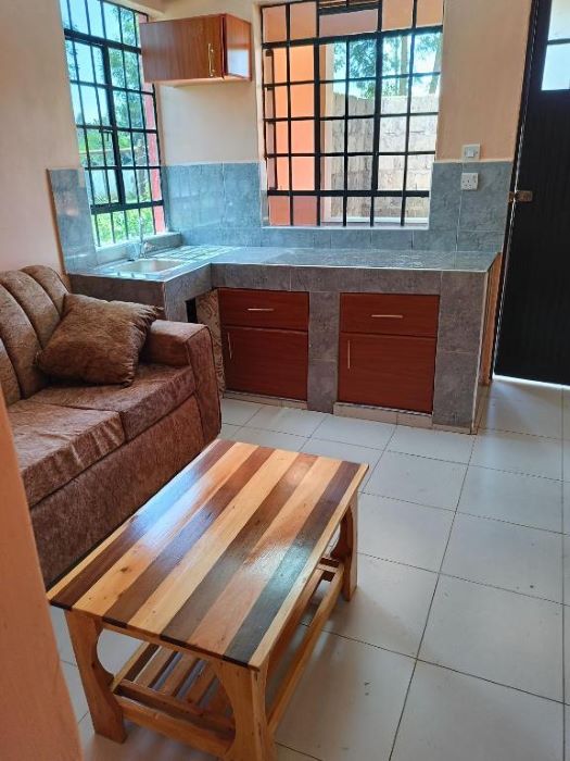 Double room with balcony and garden view at Peak Meadows Hotel Nyeri